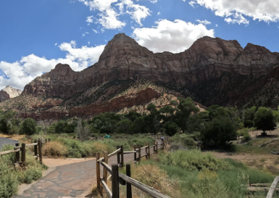 E-Bike Adventure on Pa'Rus Trail in Zion: Paved Path with Red Plateaus